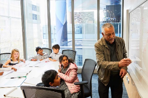 Teacher and kids in a classroom