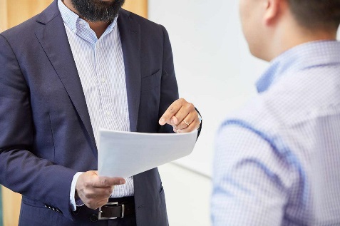 Man holding a document