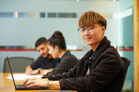 Man sitting at a computer